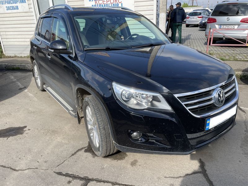 Дефлектори вікон (вітровики) Volkswagen Tiguan 2007-2016 (на скотче) (HIC) 00-00003999 фото
